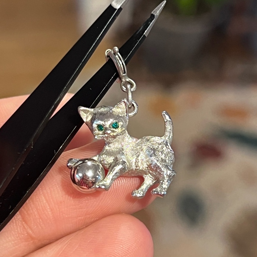 Monet Vintage Silver Tone Cat Charm Holding Ball and Green Rhinestone Eyes